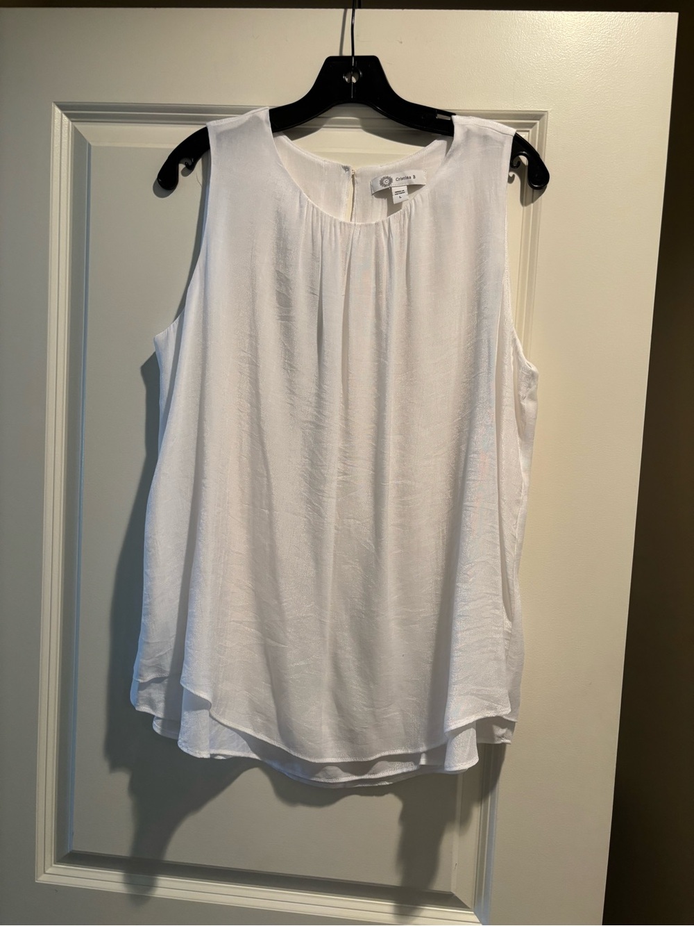 Brand new without tag White Sleeveless Round-Neck top